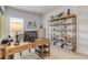 Bright office space featuring a natural wood desk, decorative shelving, and nautical accents throughout at 270 Eagle Harbor Way, Daytona Beach, FL 32124