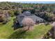 Aerial view showcasing home, pool, and expansive lot at 335 Woodridge Dr, Geneva, FL 32732