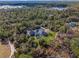 Aerial view of home and property, showing wooded area at 335 Woodridge Dr, Geneva, FL 32732