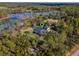 Aerial view of a house near a lake with a pin marking its location at 335 Woodridge Dr, Geneva, FL 32732