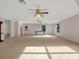 Large bonus room with carpet flooring, and plenty of space for recreation at 335 Woodridge Dr, Geneva, FL 32732