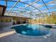 Relaxing screened pool with a spacious patio at 335 Woodridge Dr, Geneva, FL 32732