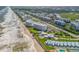 Aerial view of beachfront community and coastline at 5203 S Atlantic Ave # 814B, New Smyrna Beach, FL 32169