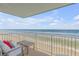 Ocean view balcony with patio furniture at 5203 S Atlantic Ave # 814B, New Smyrna Beach, FL 32169