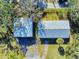 An overhead view of two metal-roofed structures at 977 Bay Dr, New Smyrna Beach, FL 32168