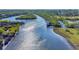 Stunning aerial view of waterfront property with a private dock at 977 Bay Dr, New Smyrna Beach, FL 32168