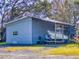 Small building with a covered boat storage area at 977 Bay Dr, New Smyrna Beach, FL 32168