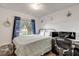Bedroom featuring neutral colors, a double bed, and a desk for work or study at 1052 Tompkins Dr, Port Orange, FL 32129