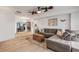 Cozy living room with hardwood floors, neutral colors, and comfortable sectional sofa at 1052 Tompkins Dr, Port Orange, FL 32129
