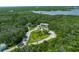 Aerial view of waterfront community and nature preserve at 116 Cedar Dunes Dr, New Smyrna Beach, FL 32169