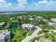 Community overview showcasing lush landscaping and waterways at 116 Cedar Dunes Dr, New Smyrna Beach, FL 32169