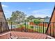Scenic balcony with tiled flooring and neighborhood views. Perfect for outdoor enjoyment at 116 Cedar Dunes Dr, New Smyrna Beach, FL 32169