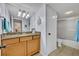 Clean bathroom with granite countertop and bathtub at 116 Cedar Dunes Dr, New Smyrna Beach, FL 32169