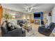 Comfortable living room with a nautical theme and ample seating, perfect for relaxation at 116 Cedar Dunes Dr, New Smyrna Beach, FL 32169