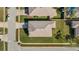 House aerial view showing roofline and landscaping at 230 Oak Branch Dr, Edgewater, FL 32141