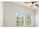 Bedroom with plantation shutters and ceiling fan at 3810 Wind Dancer Cir, Saint Cloud, FL 34772