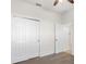 Bedroom with double doors and closet at 3810 Wind Dancer Cir, Saint Cloud, FL 34772