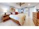 Main bedroom with a king-size bed and an ensuite bathroom at 4139 S Atlantic Ave # B608, New Smyrna Beach, FL 32169