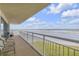 Relax on this condo's balcony with seating and panoramic ocean views at 4811 Saxon Dr # C102, New Smyrna Beach, FL 32169