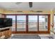 Balcony view of the ocean, beach, and a nearby building from a condo at 4811 Saxon Dr # C102, New Smyrna Beach, FL 32169