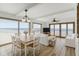Bright living room with ocean views, modern furnishings, and hardwood floors at 4811 Saxon Dr # C102, New Smyrna Beach, FL 32169