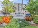 Seaward Condominiums sign with lush tropical foliage at 4811 Saxon Dr # C102, New Smyrna Beach, FL 32169