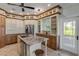 Beautiful kitchen featuring granite countertops, stainless steel appliances, and custom cabinetry at 4946 Halifax Dr, Port Orange, FL 32127