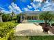 Large backyard with screened pool and fire pit at 6812 Stoneheath Ln, Port Orange, FL 32128