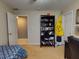 Bedroom with a bookcase, desk, and window at 6812 Stoneheath Ln, Port Orange, FL 32128