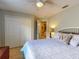 Bedroom with a king-size bed and an ensuite bathroom at 6812 Stoneheath Ln, Port Orange, FL 32128