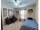 Bedroom with a twin bed, desk, and window at 6812 Stoneheath Ln, Port Orange, FL 32128