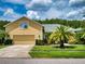 Beautiful two-story home with landscaped yard and attached garage at 6812 Stoneheath Ln, Port Orange, FL 32128