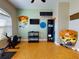 Home gym with rowing machine and weights at 6812 Stoneheath Ln, Port Orange, FL 32128