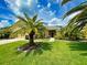 Beautiful house exterior with lush landscaping at 6812 Stoneheath Ln, Port Orange, FL 32128