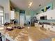 Modern kitchen with granite countertops and stainless steel appliances at 6812 Stoneheath Ln, Port Orange, FL 32128