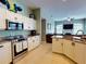 Spacious kitchen featuring granite countertops and stainless steel appliances at 6812 Stoneheath Ln, Port Orange, FL 32128