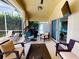 Relaxing lanai with seating and a grill at 6812 Stoneheath Ln, Port Orange, FL 32128