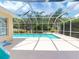 Inviting screened pool with lush landscaping at 6812 Stoneheath Ln, Port Orange, FL 32128