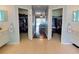 Walk-through Primary Closet connecting to the bathroom and bedroom at 6812 Stoneheath Ln, Port Orange, FL 32128