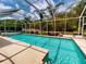 Inviting screened pool with spacious deck at 6812 Stoneheath Ln, Port Orange, FL 32128