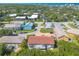 High aerial view of the property located close to beaches and nearby neighborhoods at 731 Laurel Bay Cir, New Smyrna Beach, FL 32169