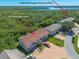 Aerial view of townhome in a community near the Indian River Lagoon Preserve Park at 731 Laurel Bay Cir, New Smyrna Beach, FL 32169