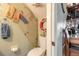 Fun nautical-themed half-bath decor with shells and beachy accessories at 731 Laurel Bay Cir, New Smyrna Beach, FL 32169