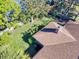 Aerial view of house highlighting backyard and landscaping at 103 Sea St, New Smyrna Beach, FL 32168