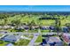 Aerial view of neighborhood with golf course view at 103 Sea St, New Smyrna Beach, FL 32168