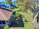 Aerial view showcasing house's backyard and landscaping at 103 Sea St, New Smyrna Beach, FL 32168