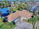 An aerial view showcasing the house and surrounding neighborhood at 103 Sea St, New Smyrna Beach, FL 32168