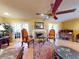 Bright living room with hardwood floors and French doors at 103 Sea St, New Smyrna Beach, FL 32168