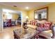 Elegant living room with a view into the dining room at 103 Sea St, New Smyrna Beach, FL 32168