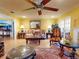 Living area with hardwood floors and large windows at 103 Sea St, New Smyrna Beach, FL 32168